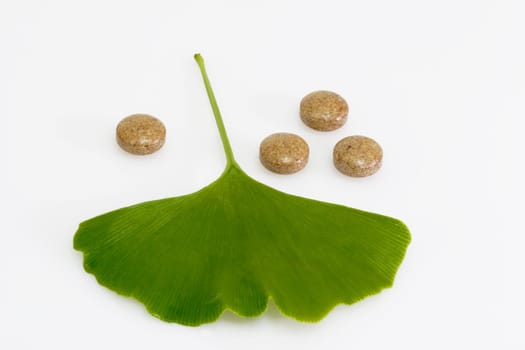 Dragees with gingko leaf