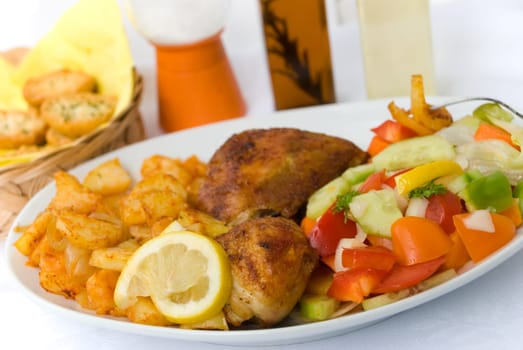 Chicken thighs with mixed salad