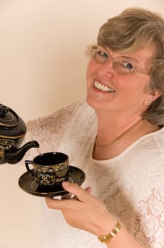 Woman at tea ceremony