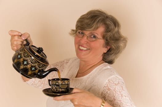 Woman pouring tea