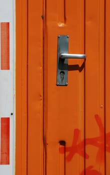 Orange sheet metal door
