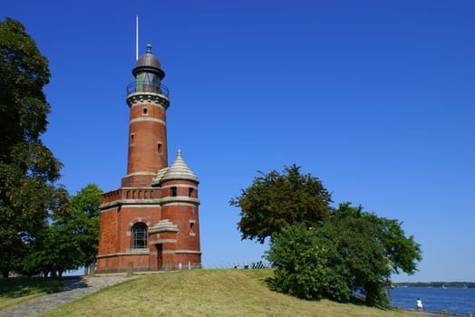 Built in 1895 for the inauguration of the Kaiser Wilhelm Canal - now the Kiel Canal. In the lower part there is a secular memorial room where you can even get married today.