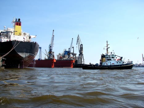 Tugboat and container ship