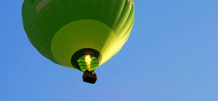 reveals a hot air balloon before you see or hear it