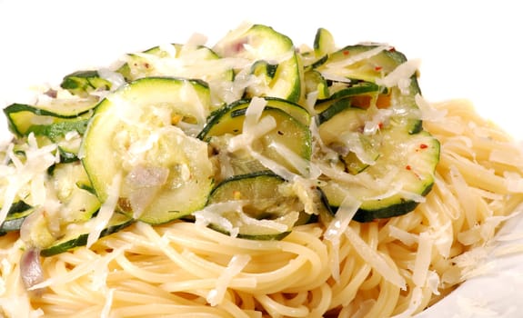 Spaghetti with zucchini vegetables and Parmesan cheese