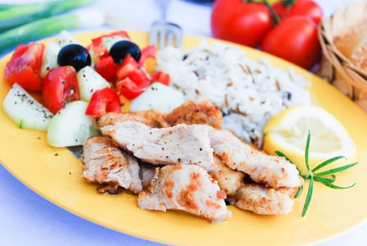 Fried chicken breast with wild rice
