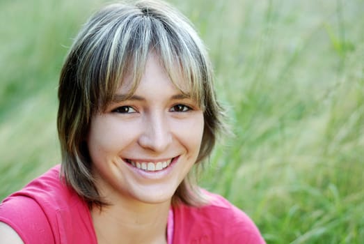 Young woman in the grass