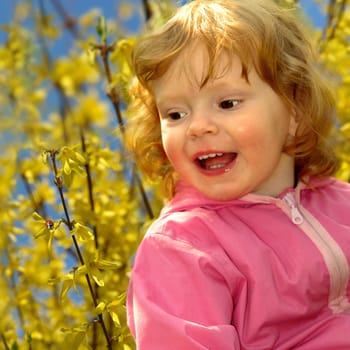 Little harbinger of spring (baby discovers ladybug)