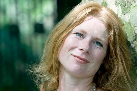 red-haired woman over 40