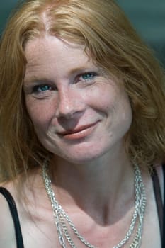 red-haired woman over 40
