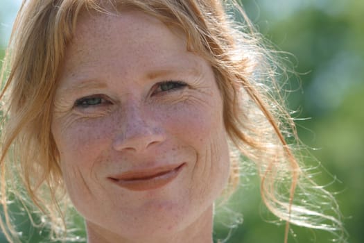 red-haired woman over 40