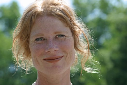 red-haired woman over 40