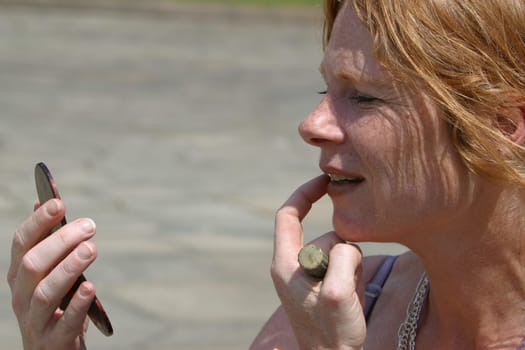 red-haired woman over 40