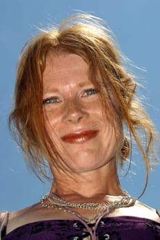 red-haired woman over 40