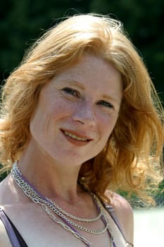 red-haired woman over 40