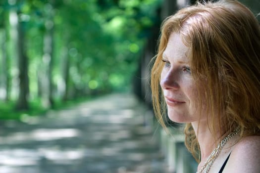 red-haired woman over 40