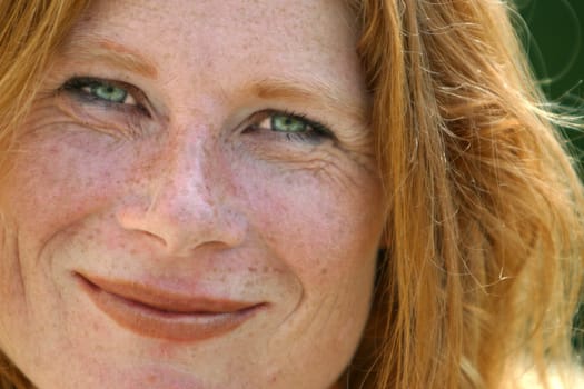red-haired woman over 40