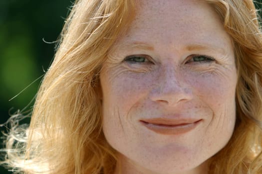 red-haired woman over 40