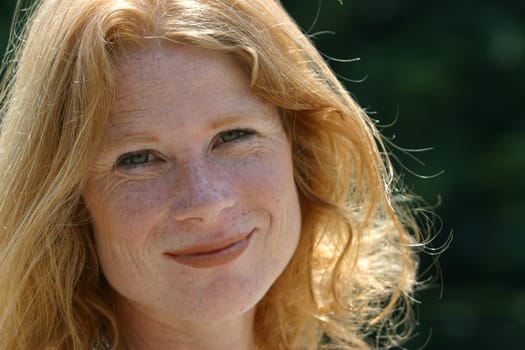 red-haired woman over 40