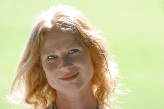red-haired woman over 40