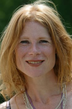 red-haired woman over 40
