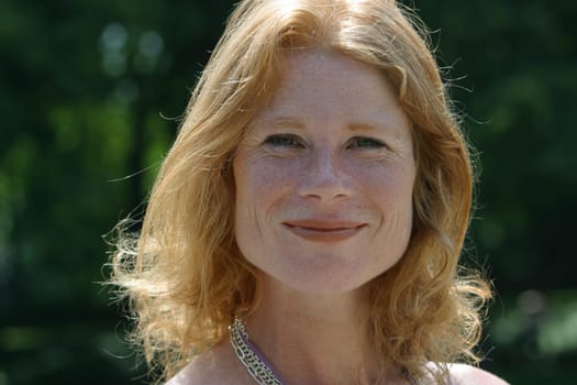 red-haired woman over 40