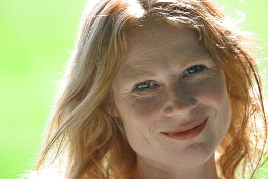 red-haired woman over 40