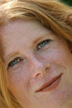 red-haired woman over 40