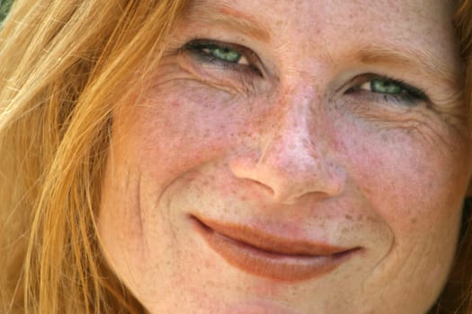 red-haired woman over 40