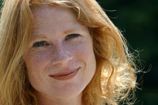 red-haired woman over 40