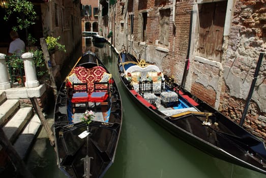 Two royal gondolas pause