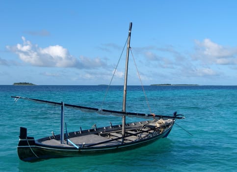 Traditional boat of the Maldives. Unfortunately,such sights are becoming increasingly rare! The mast is so crooked!