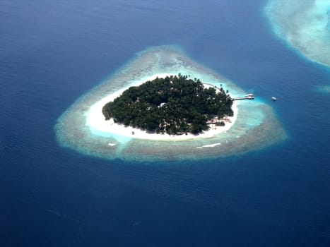 Small Maldives - island,captured by seaplane.