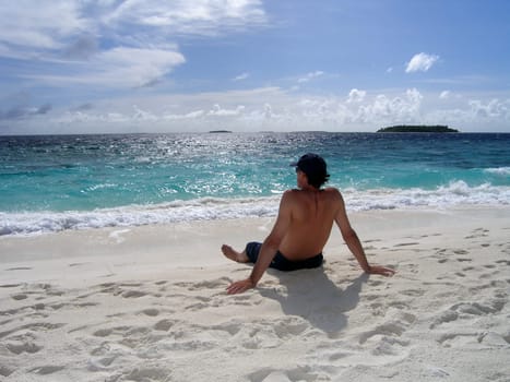 On the beach of Reethi Beach.