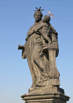 Francis of Borgia protects against earthquakes. The statue stands on the Charles Bridge in Prague.