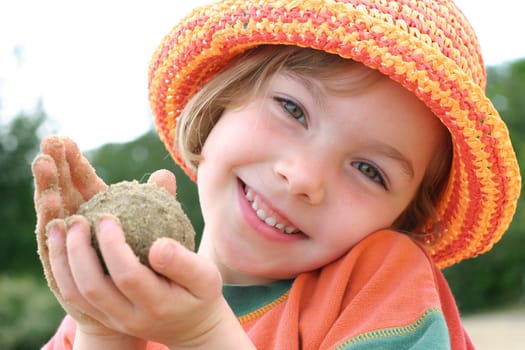 Girl playing with sand