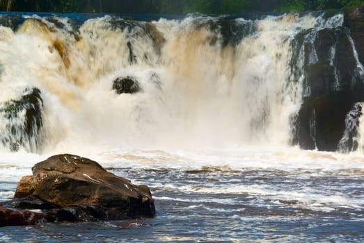 An unparalleled natural spectacle,a stream crashes into the sea over several cataracts....