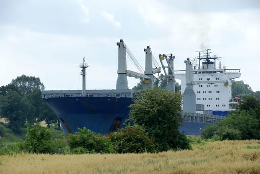 A large ship sailing through the Nor-Baltic Canal