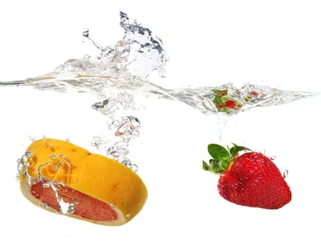 Strawberry and grapefruit in water