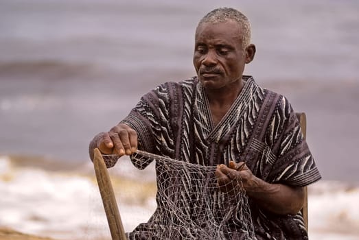 Such a net can be over fifty meters long,this one was torn open by a motorboat,so it has to be patched up for days....