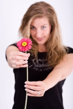 I hand over a flower