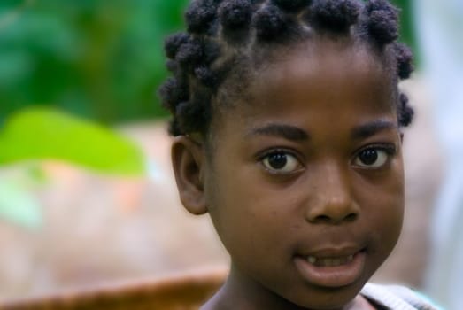 Marie Lise is the daughter of Madame Eloundou and she also has to help carry bananas,but her collar is not that big. She is a very bright girl.... she wants to become a doctor one day,with her great school performance she is on the best