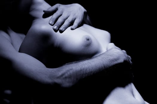 Hugging naked female torso