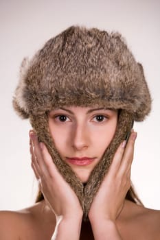 Woman with fur cap