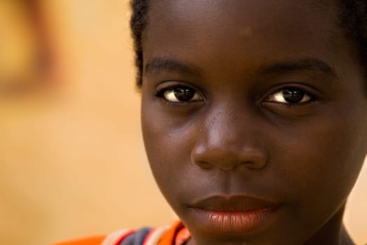 Nathalie,you enchant with your gaze.... another village beauty from Ngobelen