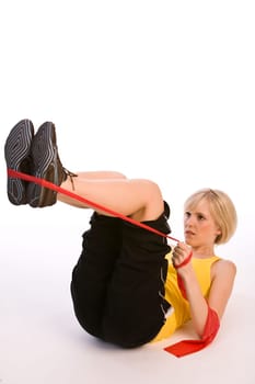 Woman exercising with ribbon