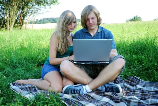 Young couple with laptop