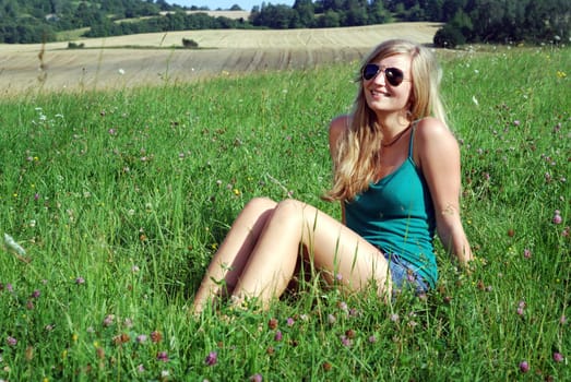 Young woman in the grass