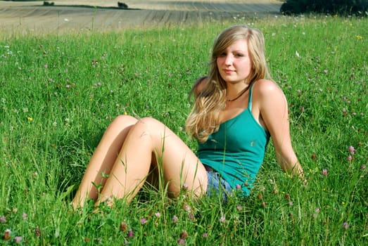 Young woman in the grass