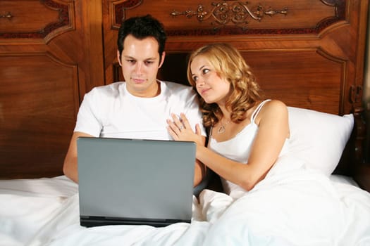 Young couple in bed